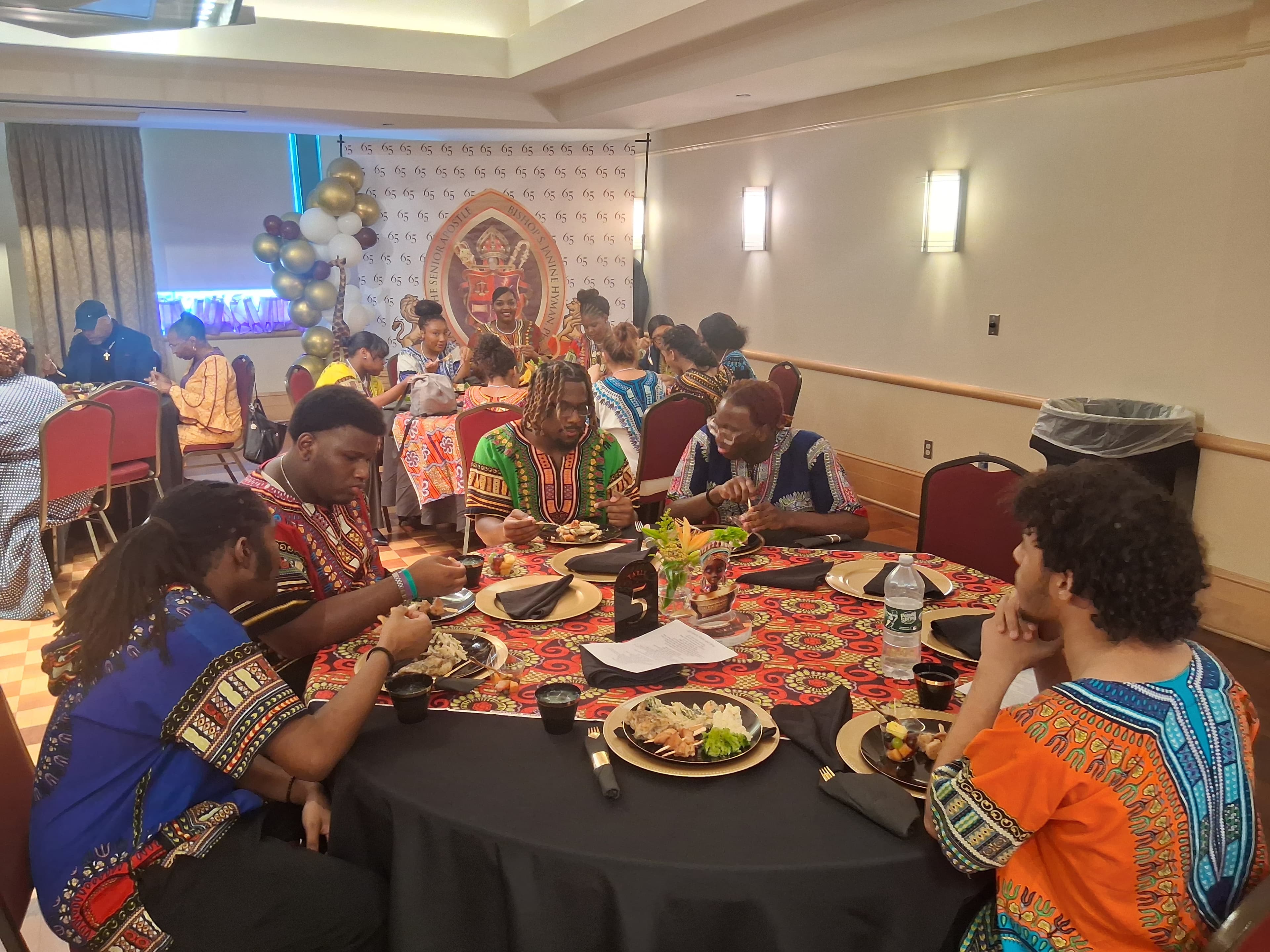 Songs of Solomon community arts programming around a shared table